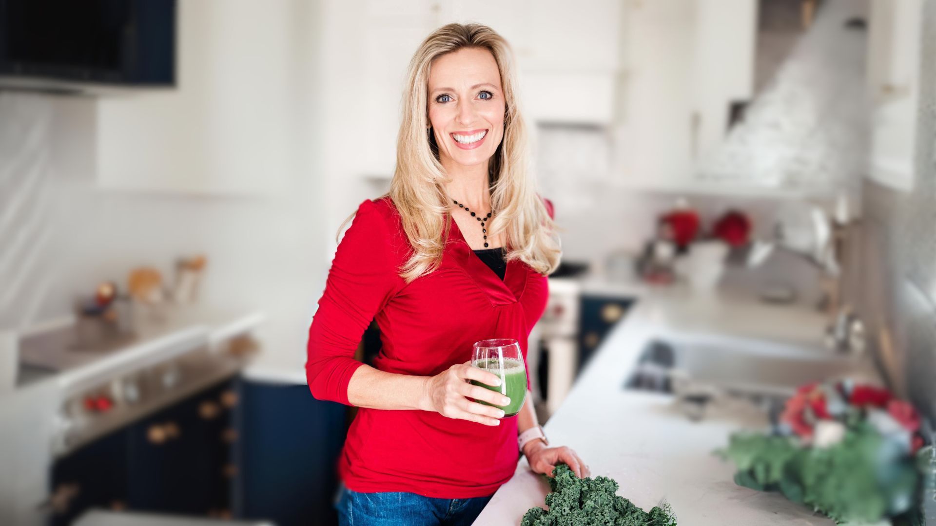 Wendie Pett, ND in the kitchen with a green drink that can help naturally boost the immune system to reduce inflammation