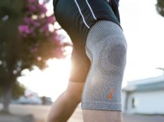 Close up of a knee wearing Incrediwear® wearable anti-inflammatory® therapy to represent how to get Visibly Fit™ with Wedie Pett, ND.