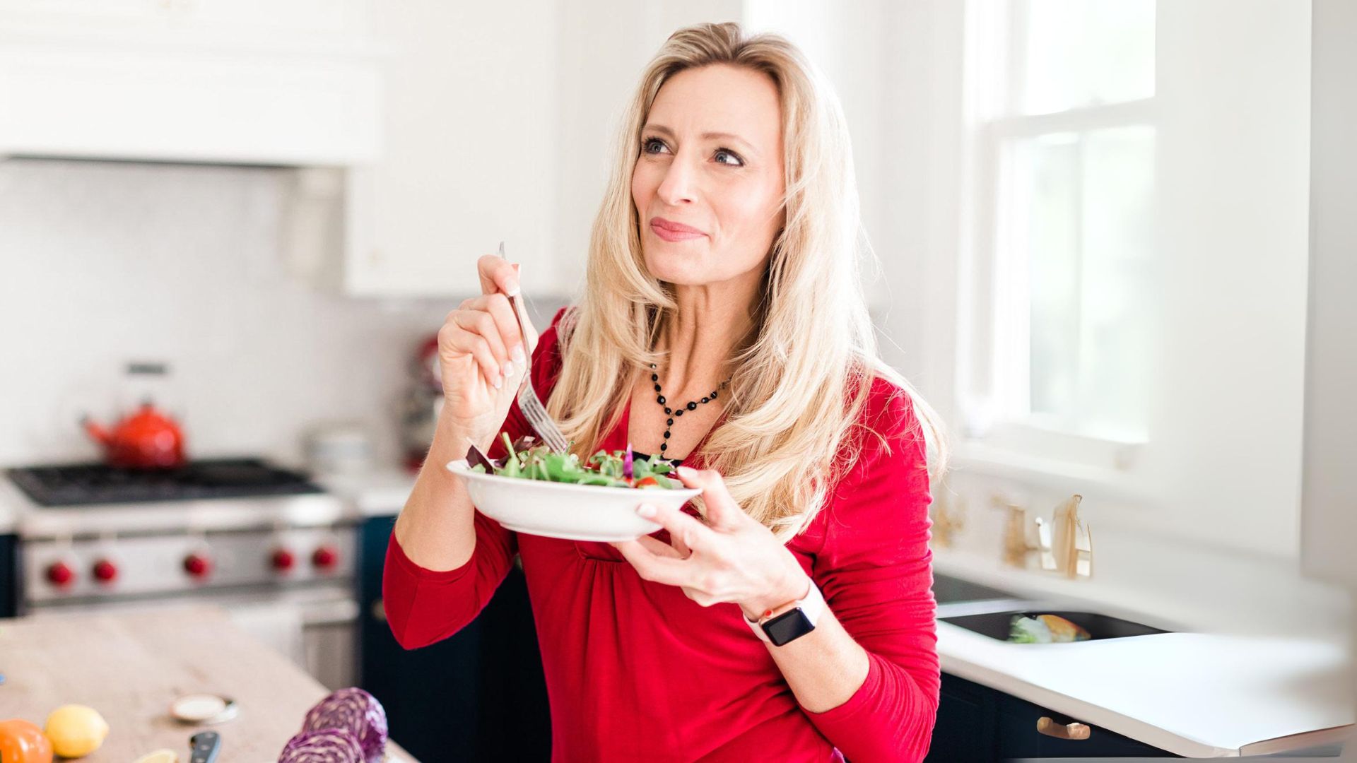 Photo of Wendie Pett, ND eating a healthy green salad to represent her expertise in nutrition to help you get Visibly Fit™ in mind, body and spirit.